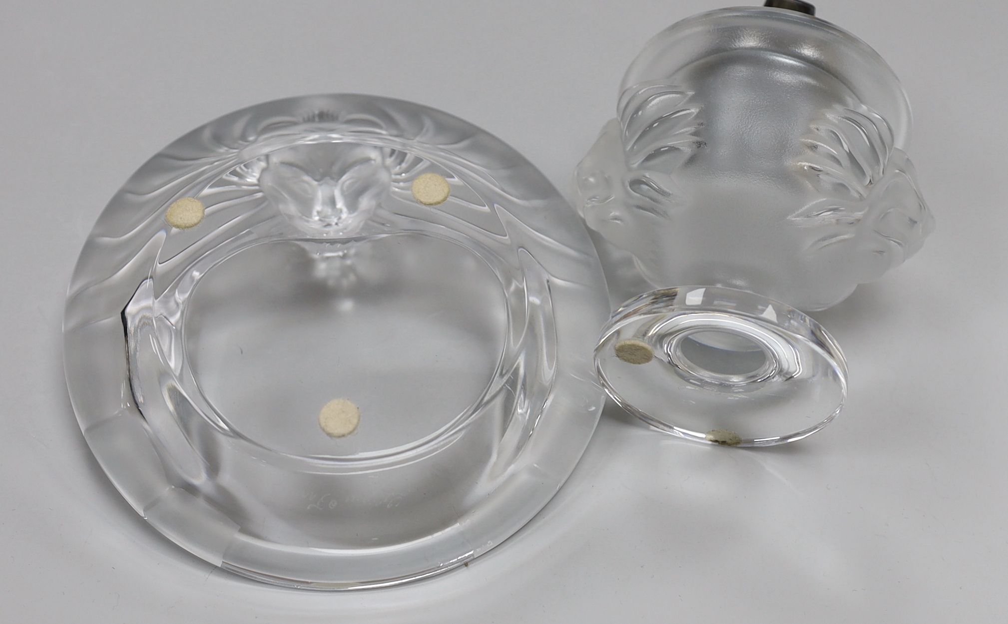 A Lalique glass tete de lion lighter and ashtray, lighter 12cm high (2)
